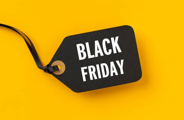 Sale tag with Black Friday written on yellow background for Black Friday concept